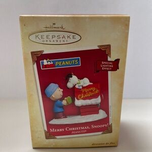 Hallmark Ornament Merry Christmas, Snoopy! Peanuts 2004 new in box.